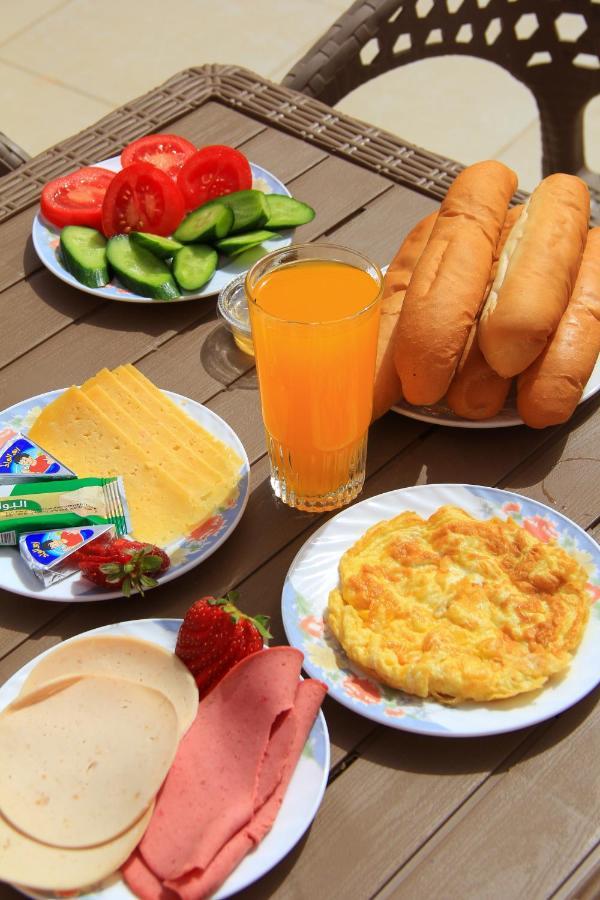 Pyramids Road Guest House Cozy Rooms And Rooftop Breakfast With The Pyramids View Nazlet el-Sîsi Zewnętrze zdjęcie